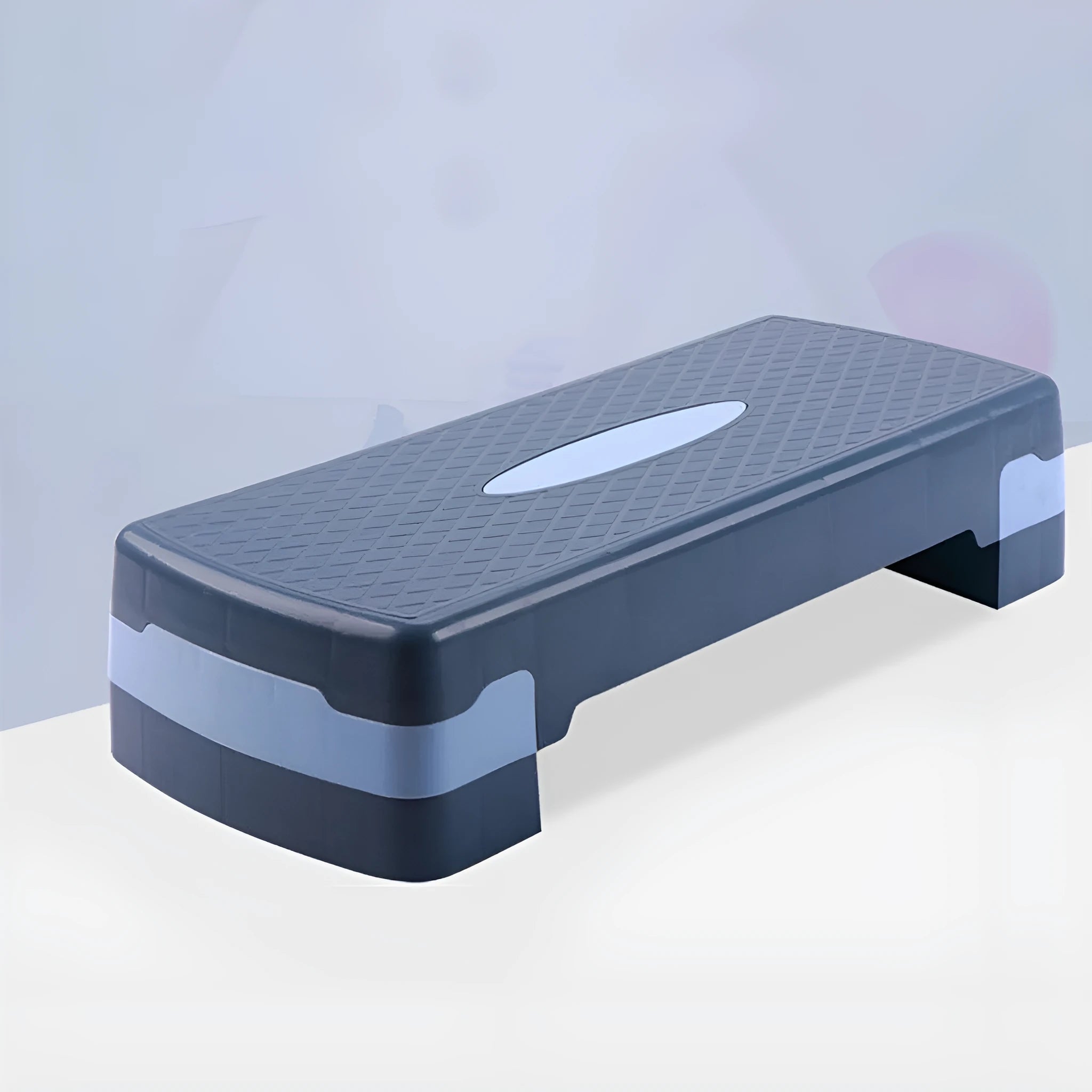 Grey Fit Step aerobic exercise platform on a home floor.