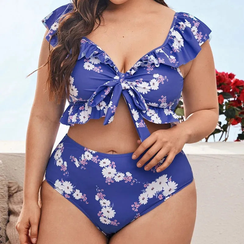 Women's plus size split bikini in polyester with spandex lining, available in XL to 4XL and black, blue or multicolour.