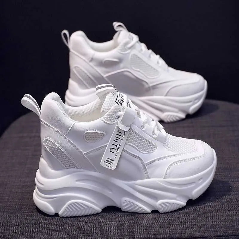 Women's black mesh platform casual shoes with hollow-out design and toe holder on a TPR sole.