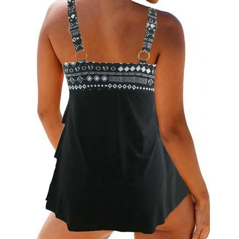 Plus size women's split swimsuit with double shoulder straps and a bow, in polyester fabric.