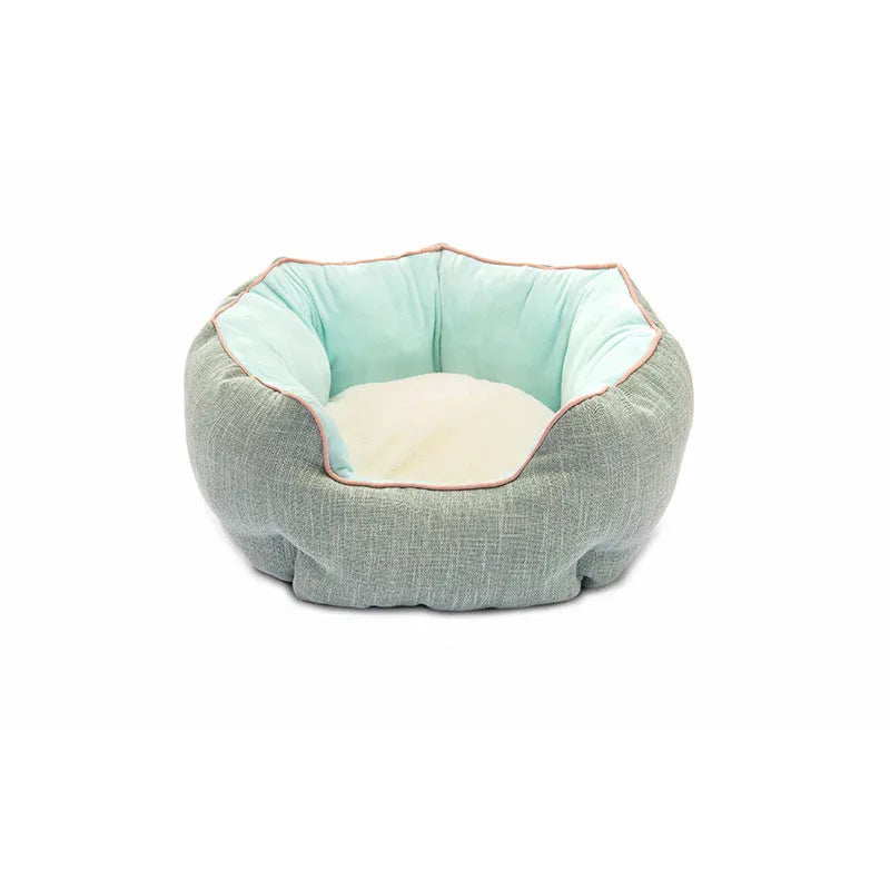 Blue octagonal pet bed with raised sides and a removable mat, for a small dog or cat.