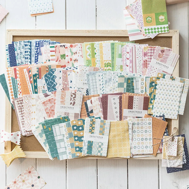 Assorted retro dessert-themed note papers in colours like caramel puff and strawberry coconut, 50 sheets per pack.