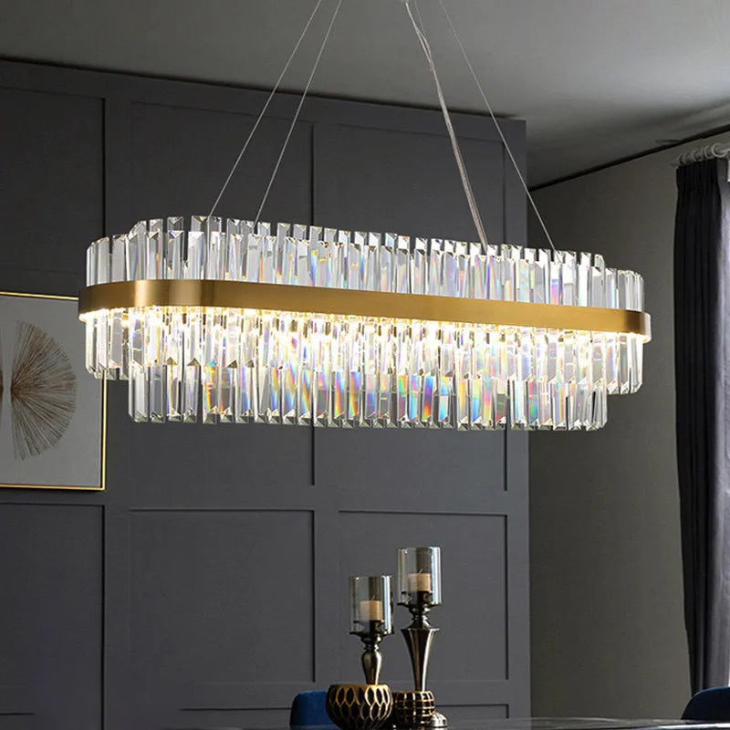 Modern crystal and stainless steel chandelier with multi-head fish-shaped design and LED lighting