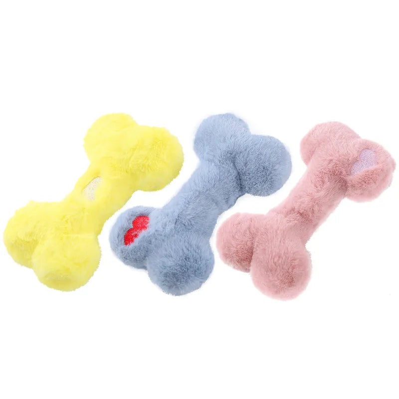 Blue love bone shaped plush dog toy with squeaker on a white background
