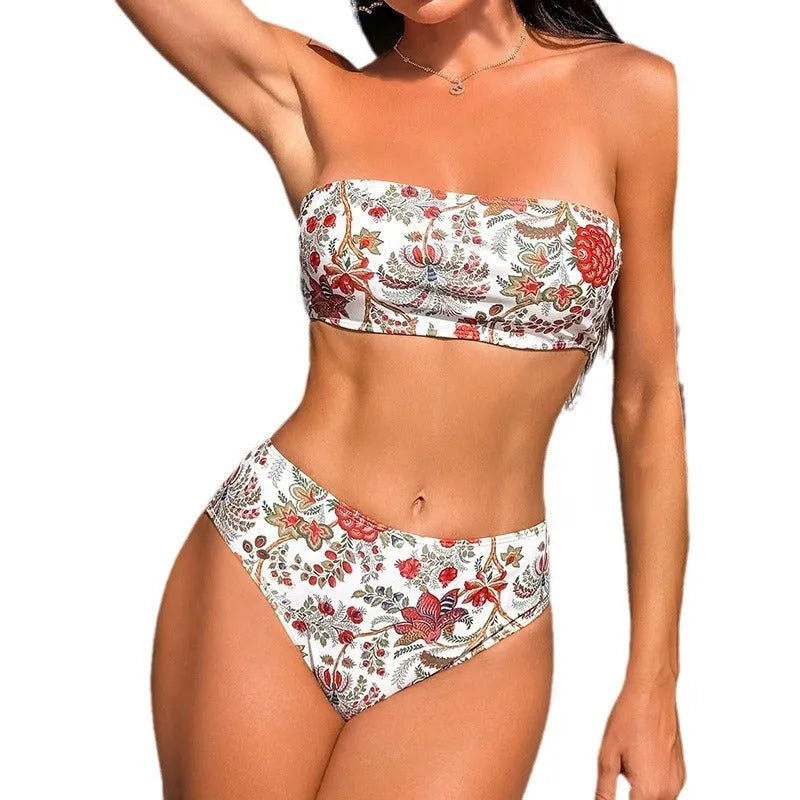 Women's printed bandeau swimsuit set with strapless top and high-waisted shorts on a neutral background.