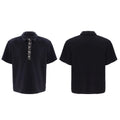 Men's black loose fit polo t-shirt with square collar and heavy embroidery sequin detail on chest