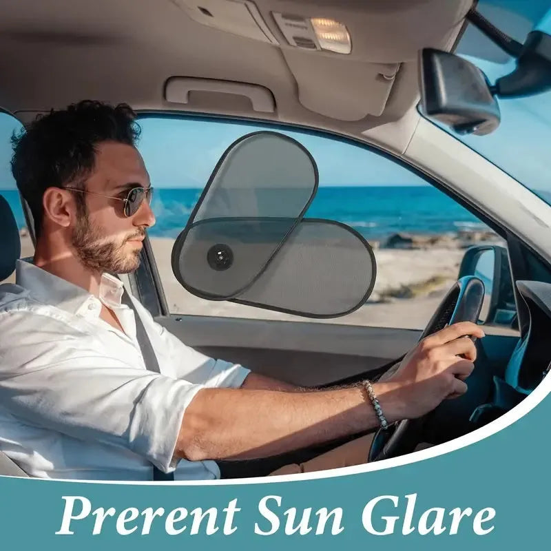 Black breathable mesh car side window sunshade stretched over glass with visible suction cups.