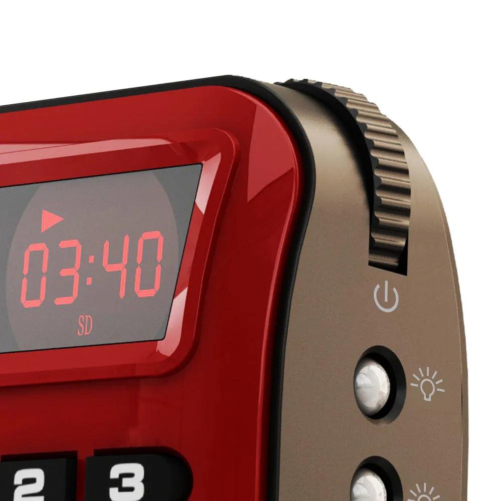 Golden Rolton W405 portable FM radio and MP3 speaker with LED display on a textured surface.
