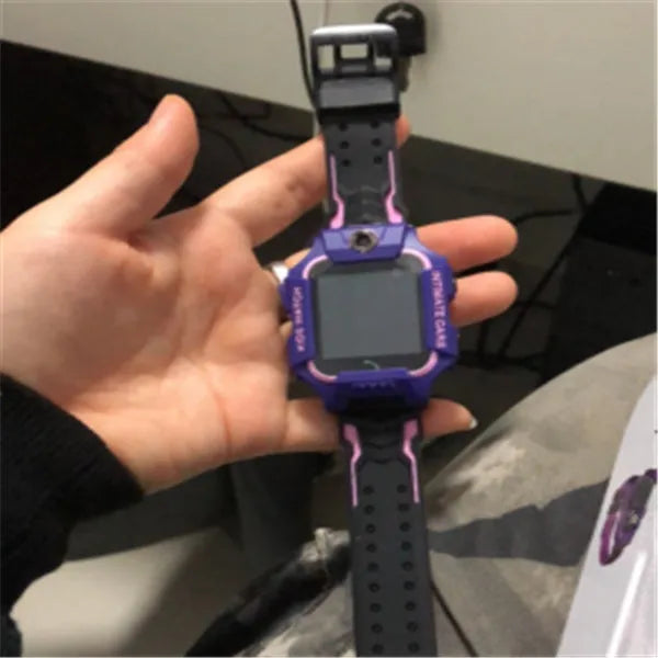 Children's smart watch with dual cameras, SOS button, and touch screen on a child's wrist