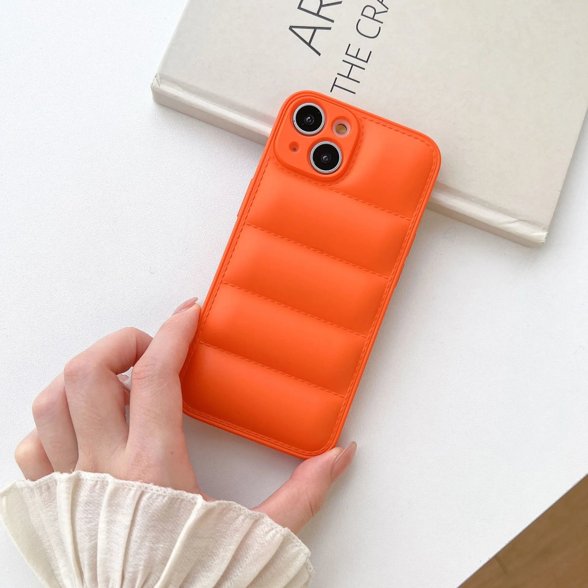 Plastic down jacket phone case for iPhone 15 series in black, shockproof TPU back cover