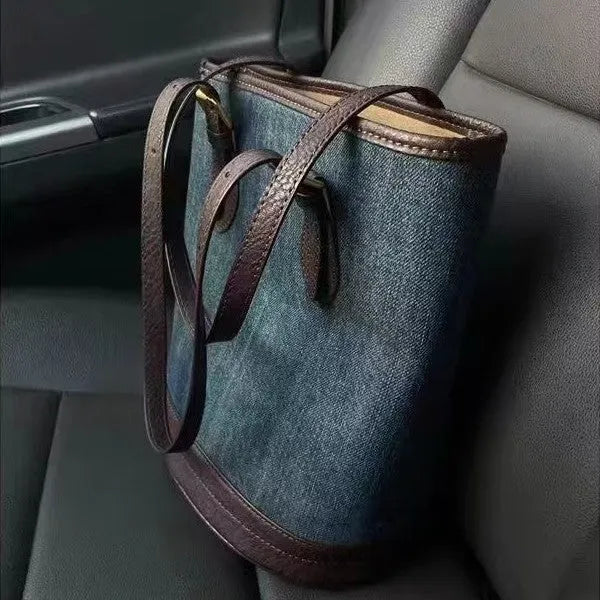 Retro denim patchwork one-shoulder bucket handbag in denim colour.