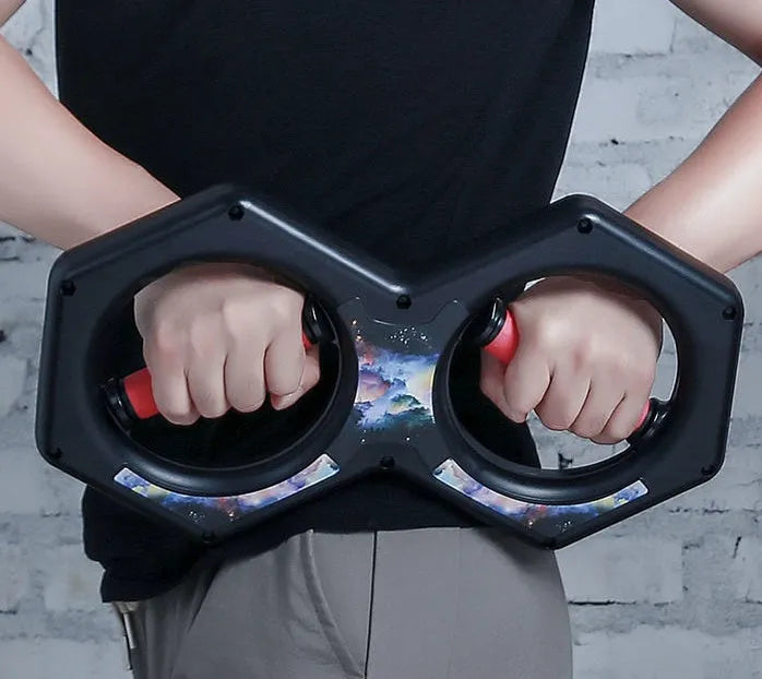 Black ABS figure 8 wrist power machine grip trainer on desk