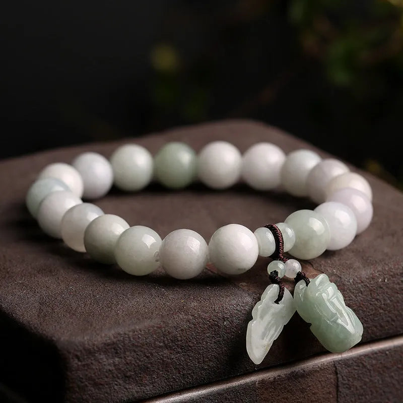 Natural jade hanging bracelet with geometric shape showing six colour and design variations.