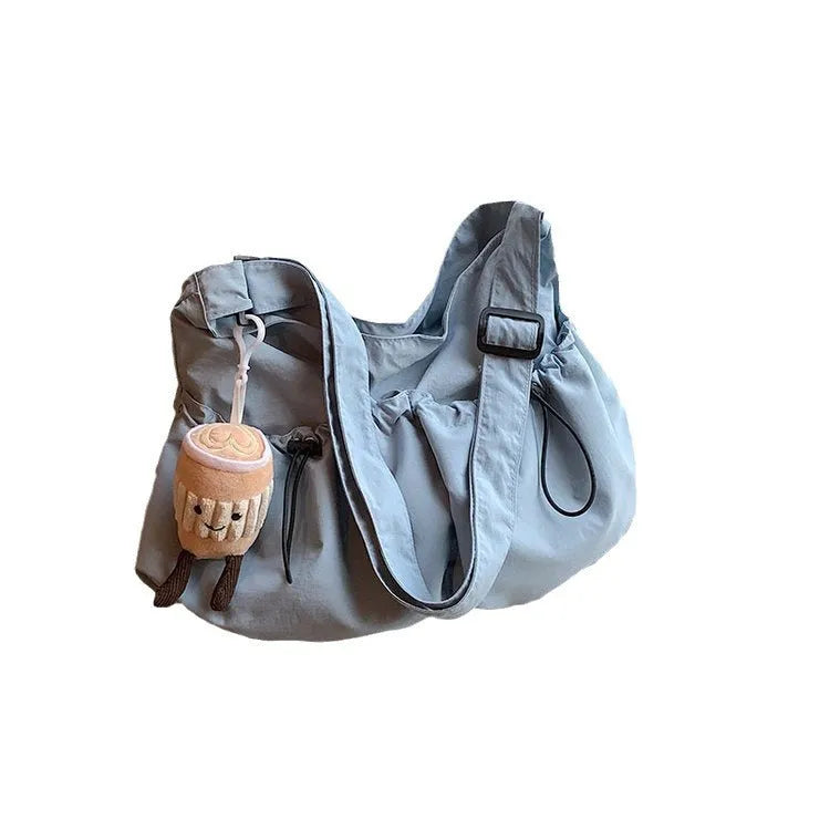 Ultra-light pleated polyester crossbody bag for students with split pocket and mobile phone compartment in beige, black, blue, brown or green