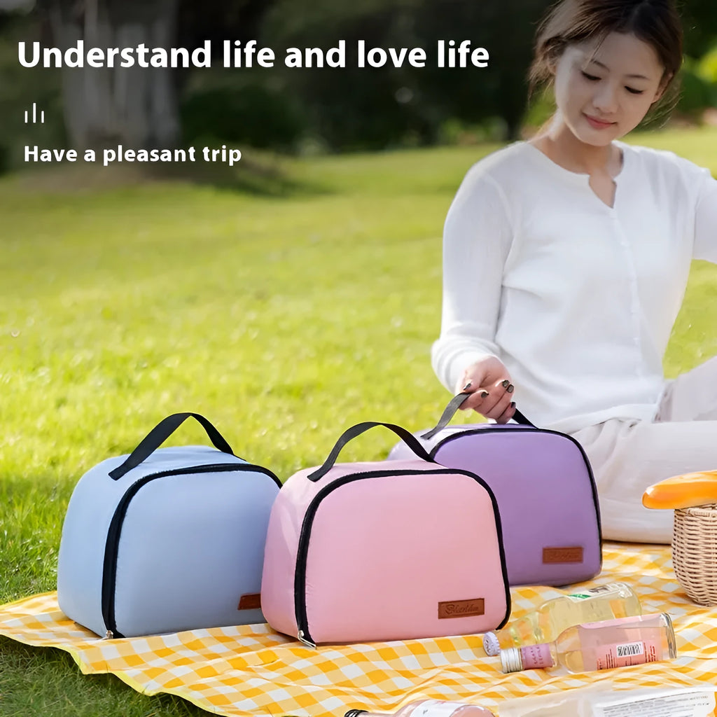Insulated lunch bag in textured cloth material with bento handbag style and modern minimalist design
