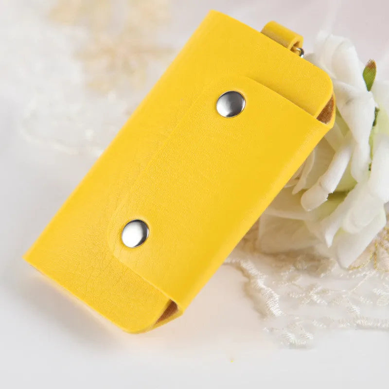 Colourful button closure PU leather key case in square vertical shape with soft plain finish