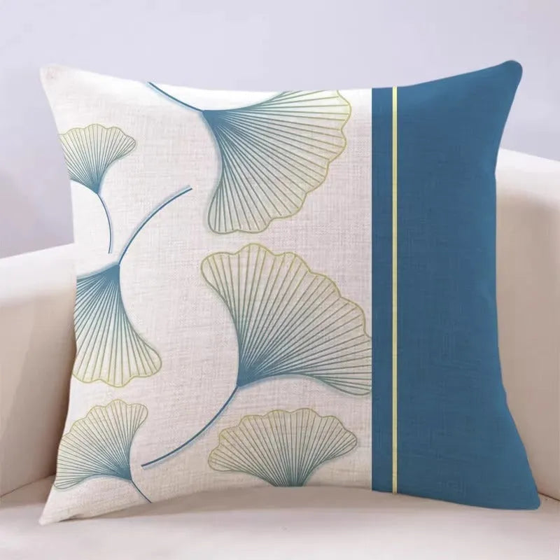 Ginkgo leaf printed square cushion cover on a sofa, available in multiple colours and sizes