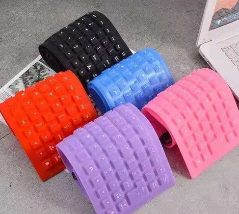 85 key wired silicone mute soft folding keyboard in pink with USB cable