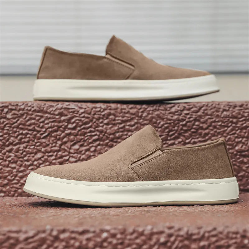 Men's apricot and grey casual slip-on shoes with round toe and rubber sole on a white background.