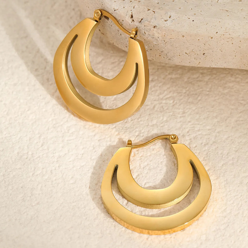 Geometric gold-plated French earrings with round ring elements, available in gold or steel colour
