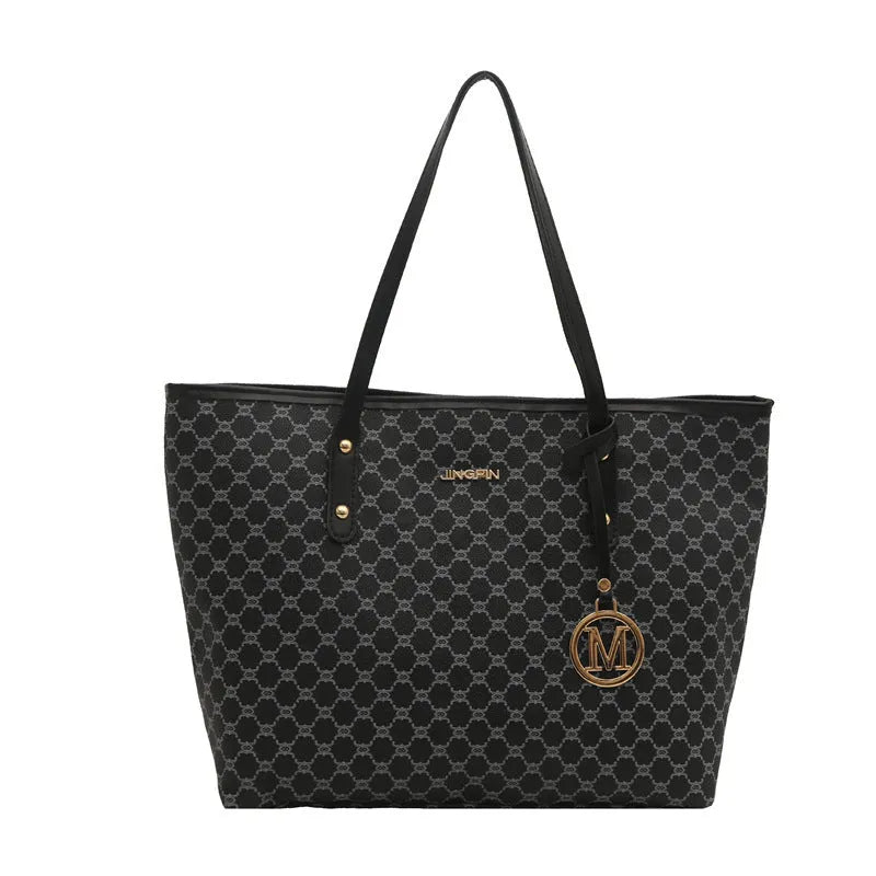 PU leather shoulder bag with sewing thread detail in black, shown with measurements.