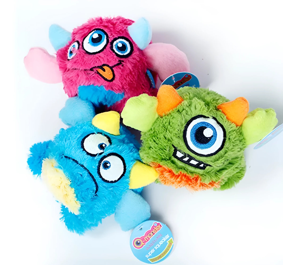 Monster dog toy with TPR spiky ball inside and squeaker, shown in green, blue, and rose red, 12cm and 6cm sizes.