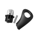 Black plastic Honda Accord gear shift button replacement kit with spring and side plate.