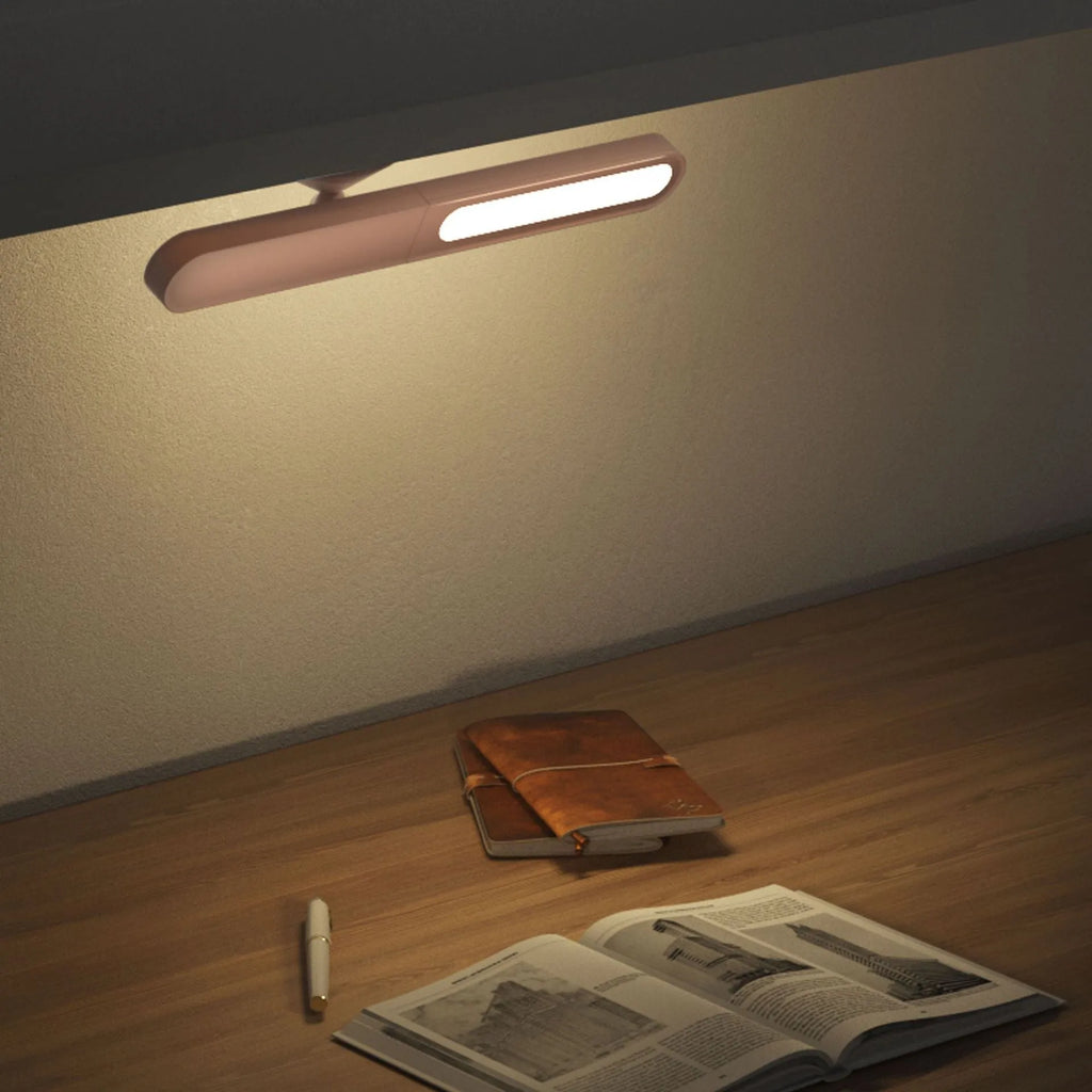 Creative geometric desk lamp in white with magnetic suction base and touch switch, USB powered