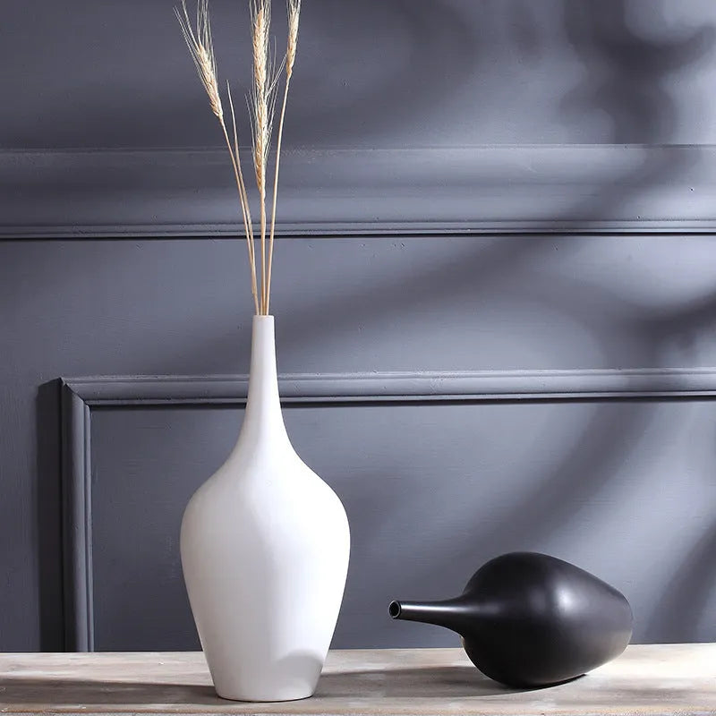 Tall white matte glaze ceramic vase HP160 on desktop with flowers