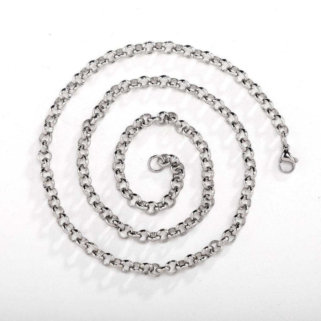 Silver stainless steel men's punk ring buckle necklace with O-ring chain and copper zircon pendant on dark background