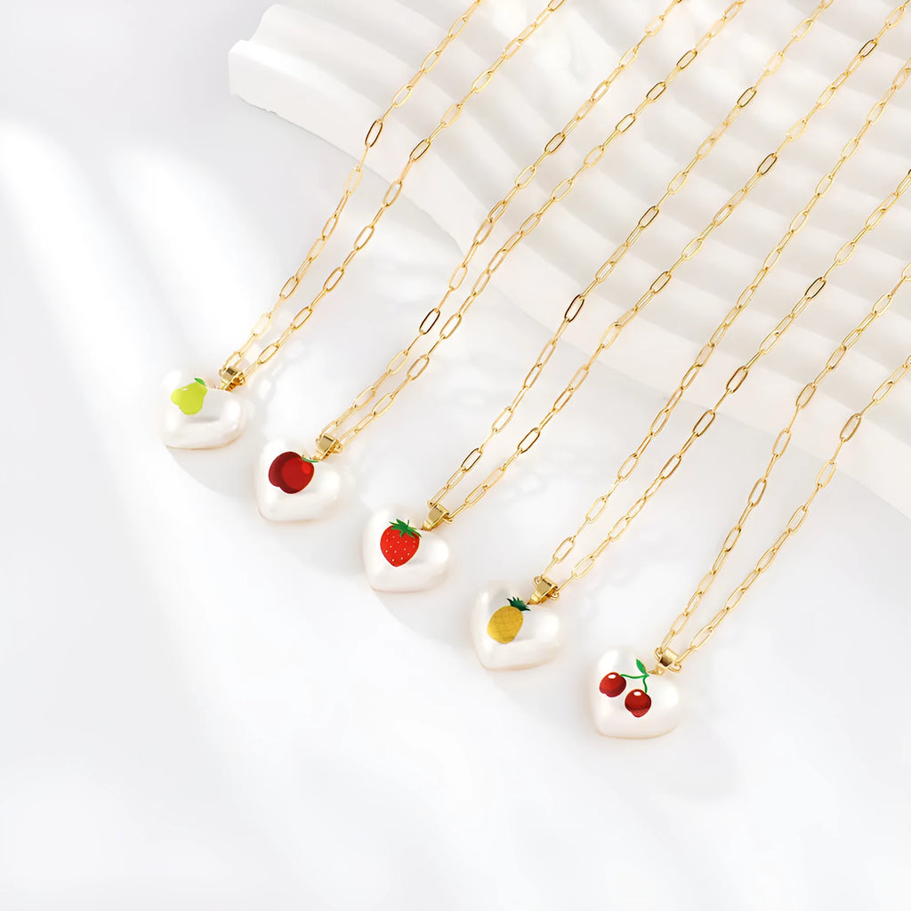 Adjustable necklace with heart charm and fruit pendant on 21-50cm chain