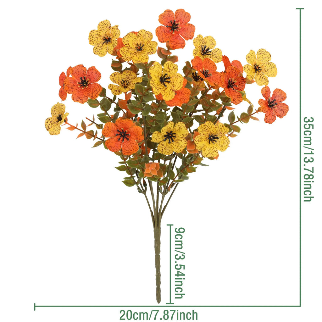 Artificial flower bouquet in autumn colours made from plastic and silk materials.