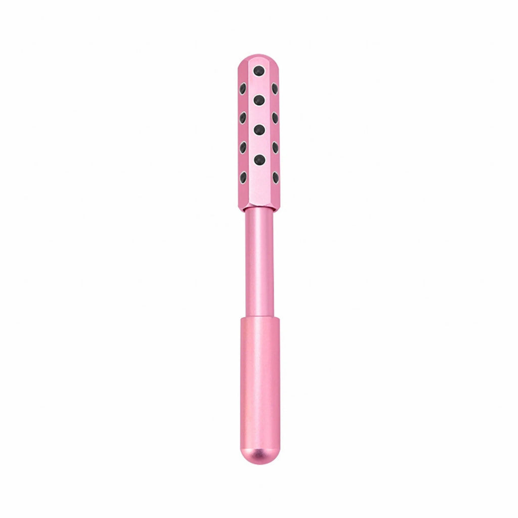 Purple germanium particle facial massage roller on a white background.