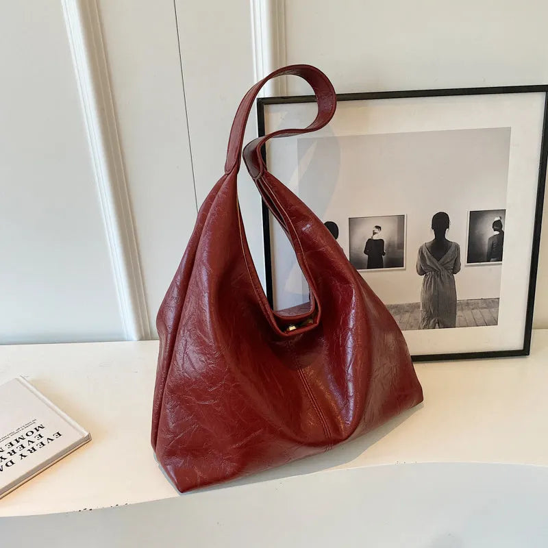 Soft PU leather shoulder bag with multiple external sandwich pockets in street-style design