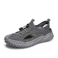Men's black sports sandals with elastic band closure and rubber sole for outdoor waterproof activities