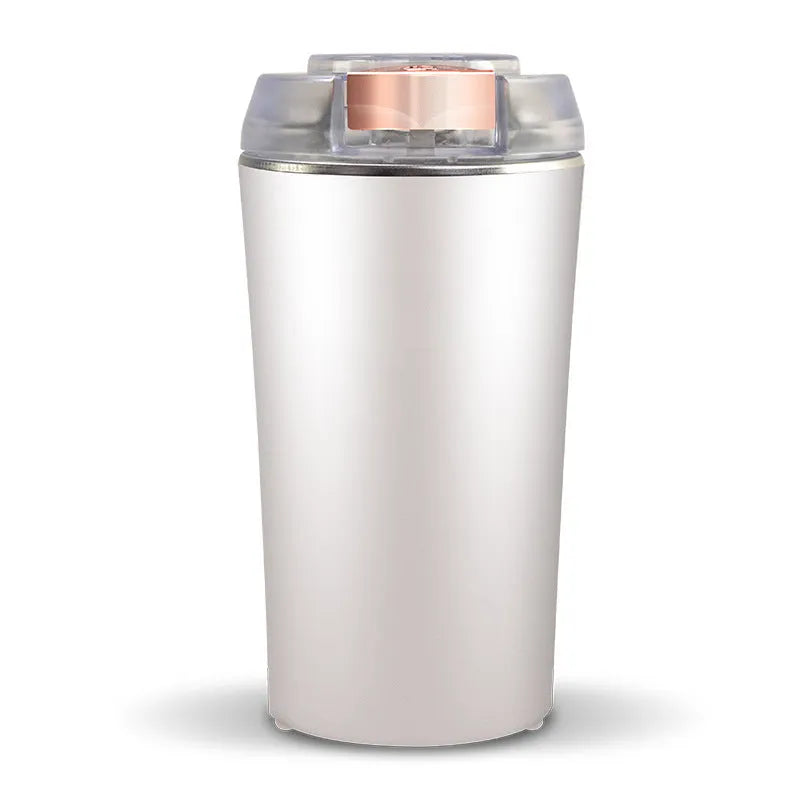 Blue mini flour mill and grinder machine for spices and grains with adjustable settings.