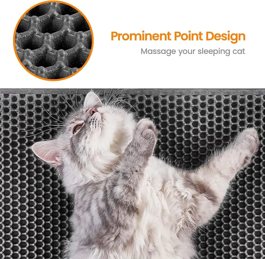 Black honeycomb double layer cat litter mat with non-slip bottom placed near litter box