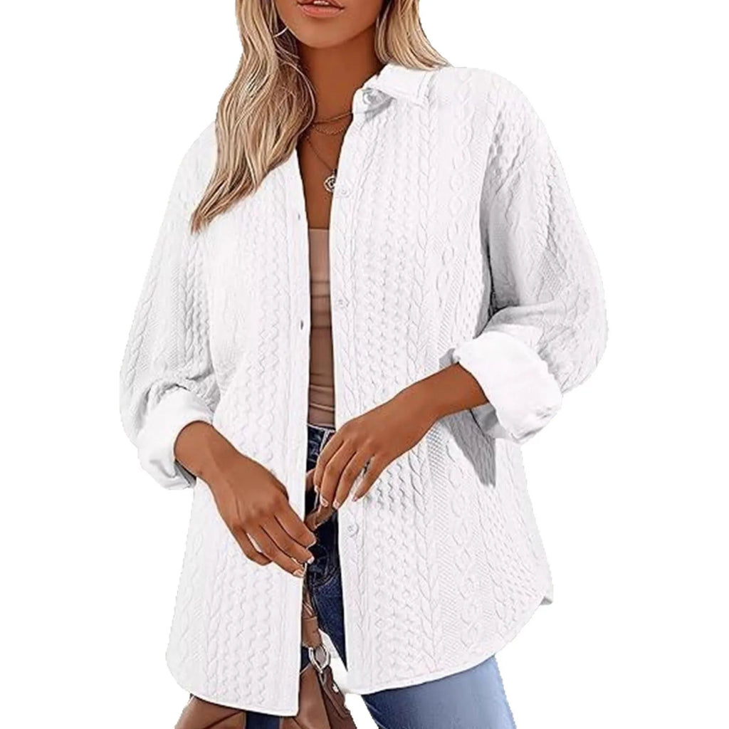 Women's solid colour knitted cardigan with long sleeves in black, shown on a model