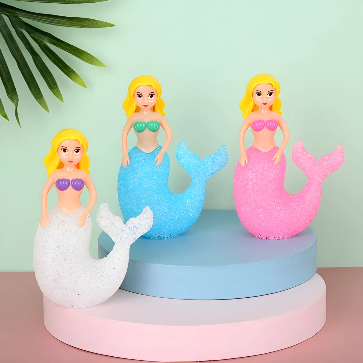 Plastic mermaid LED night light with colourful glow, 15.4cm high, available in white, pink, or blue