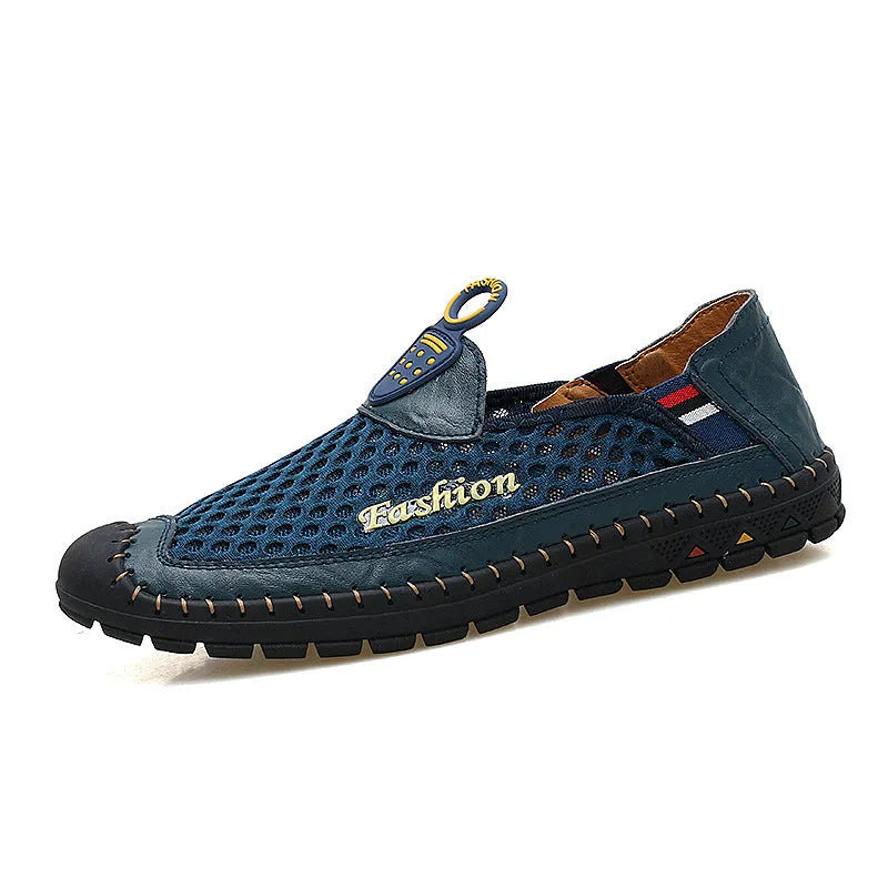 Men's brown mesh casual shoes with round toe and rubber sole on a plain background.