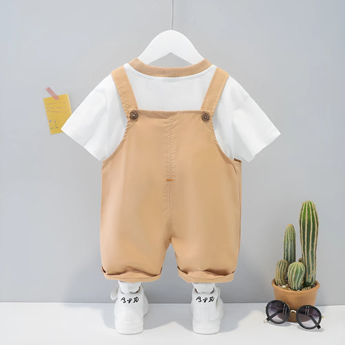 Yellow cartoon print baby overalls with adjustable straps, short sleeves, and an openable front.