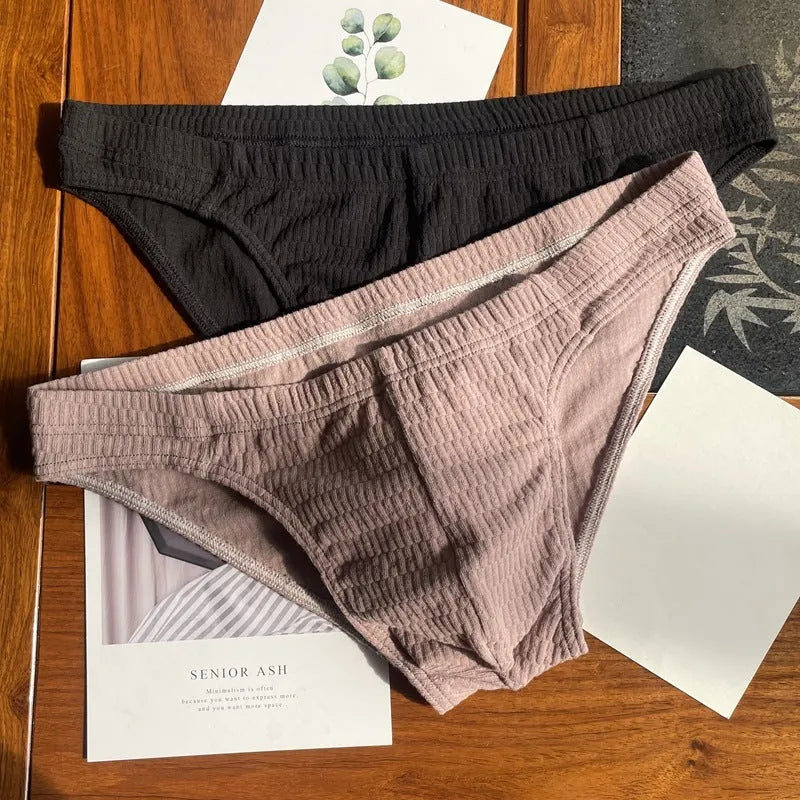 Men's solid colour cotton triangle underwear briefs showing mid waist design and available colour options