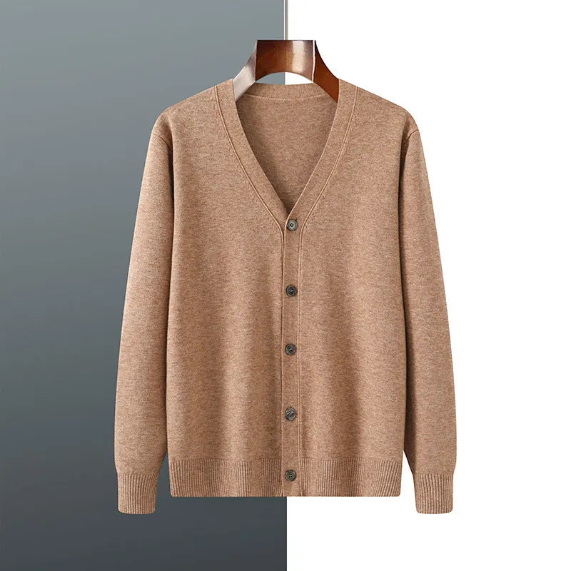Man wearing a beige Andy velvet V-neck knitted cardigan coat with long sleeves.