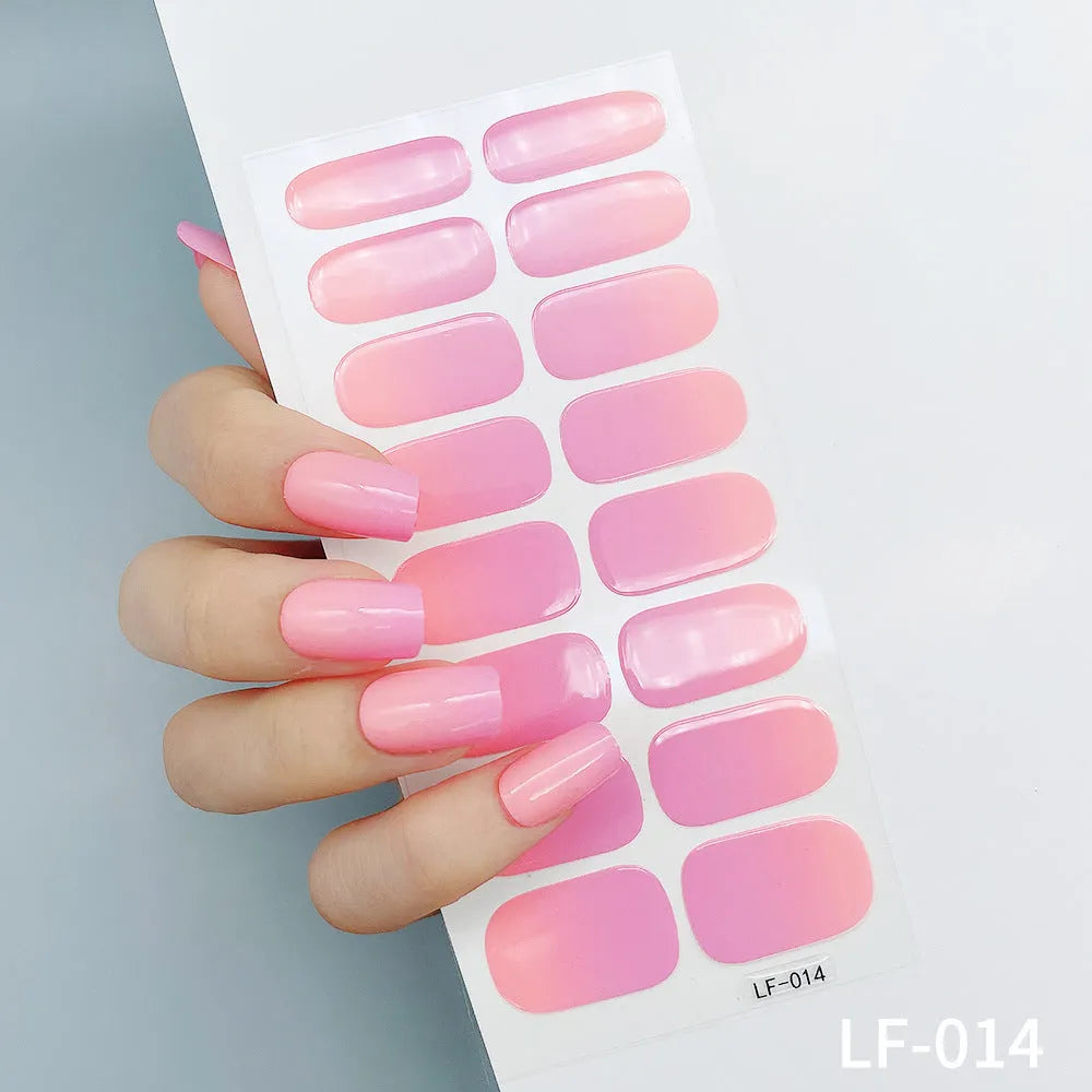16 solid colour full nail art stickers with 22 patterns including cross, rose, butterfly designs in 12x6mm oval size