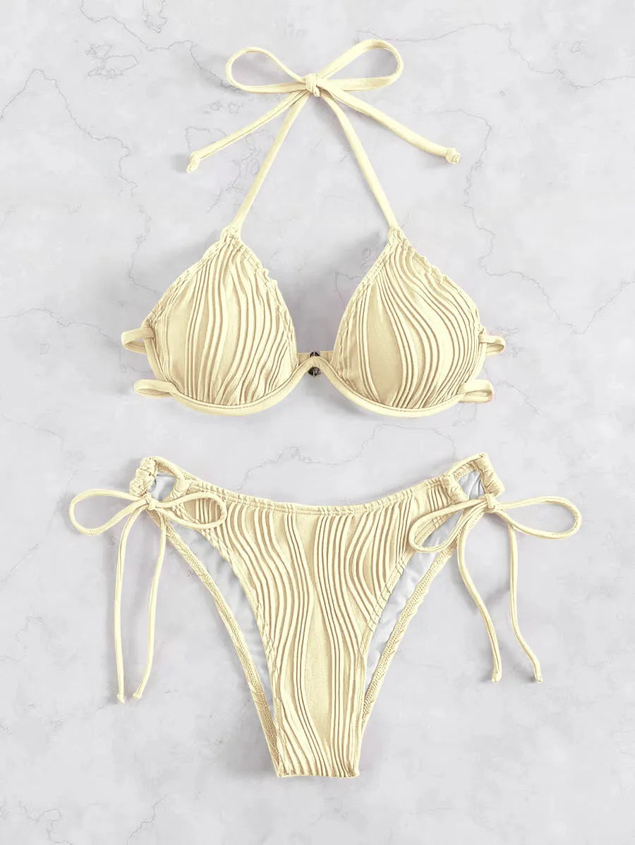 Women's apricot coloured bikini set with underwire cups and adjustable ties.