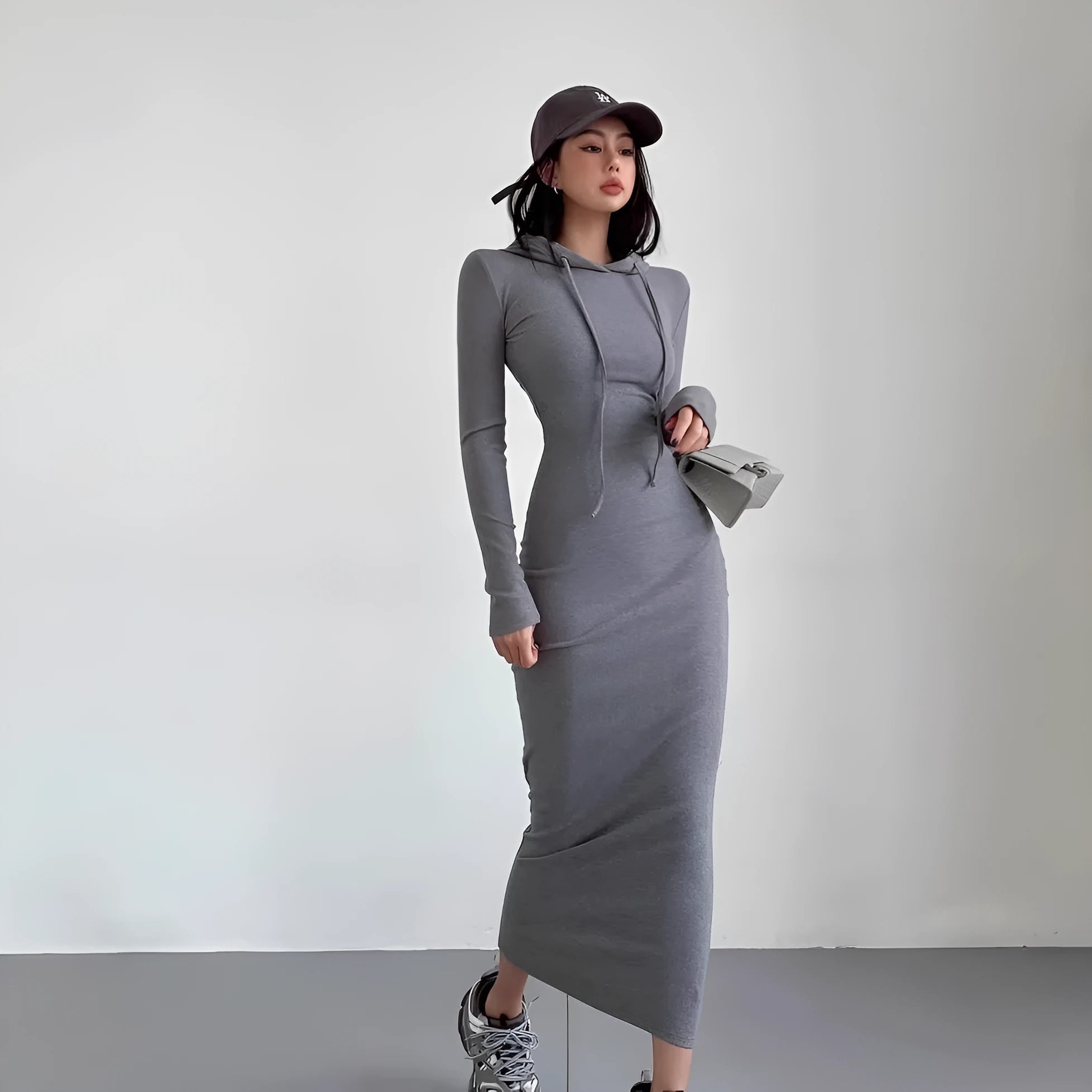 Women's grey hooded sheath dress with long sleeves and knee-length high-waist design