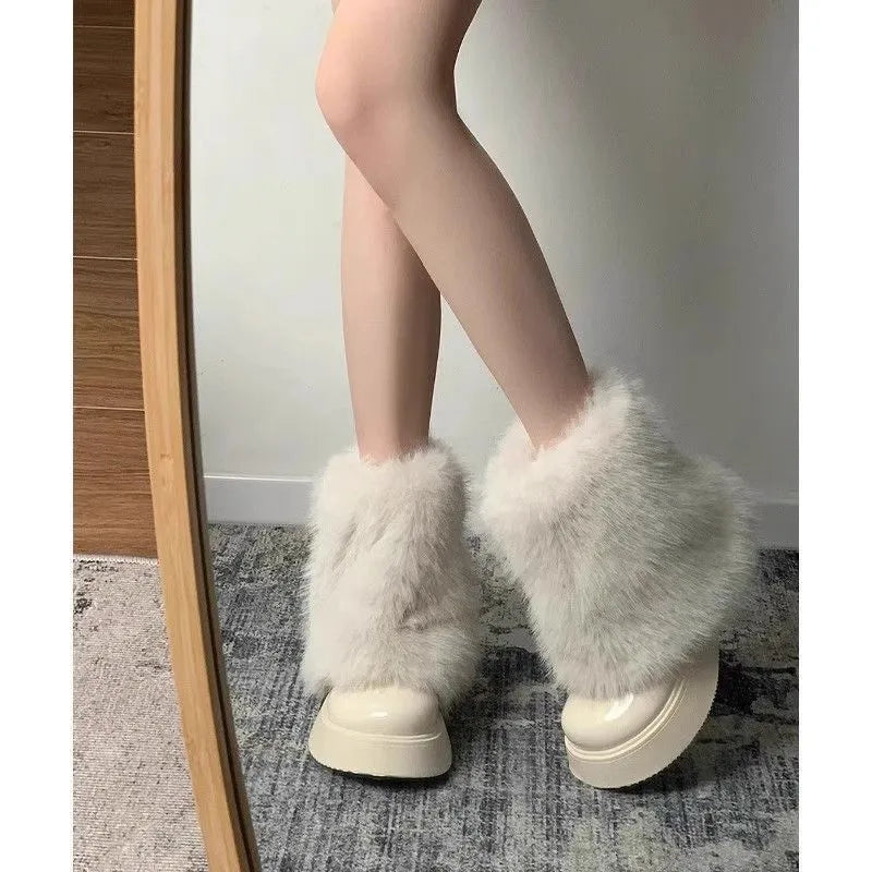 Women's black fleece-lined winter snow boots with a waterproof rubber sole.