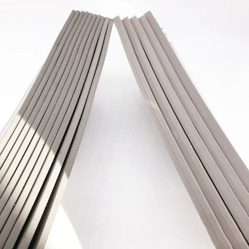 Black and grey plastic photosensitive mat for seal pottery, showing 330mm by 110mm sheet size.
