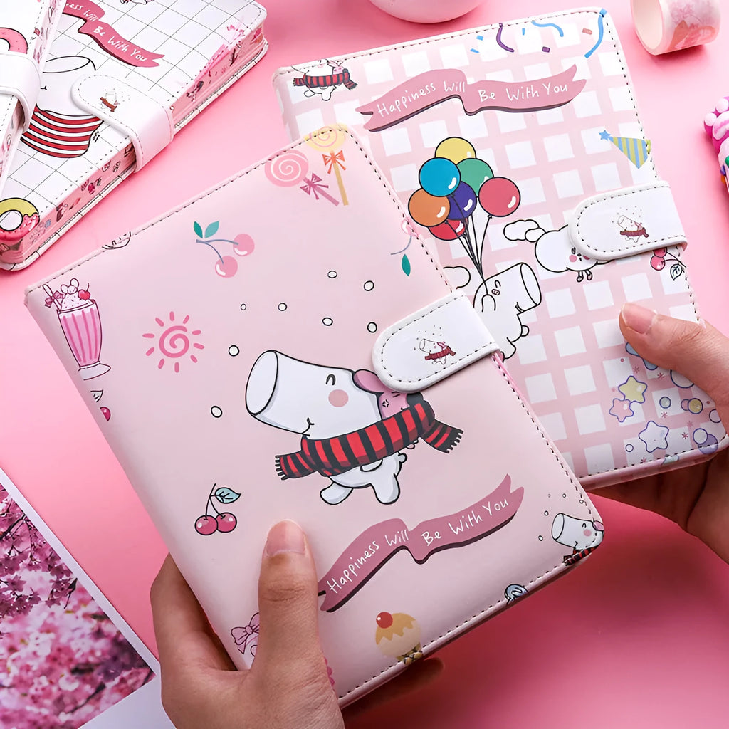 Small white notebook with magnetic buckle showing Kaba Bear Hippo design on PU leather cover