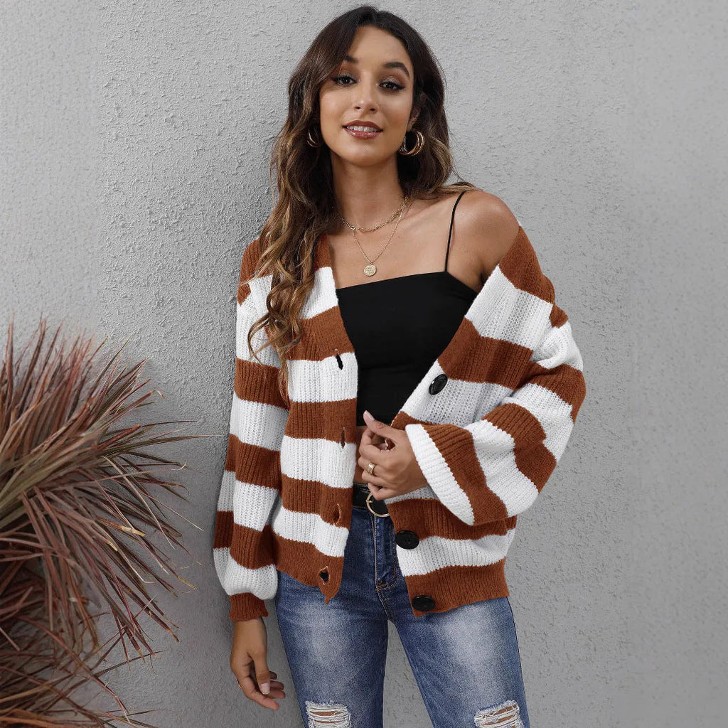 Blue striped women's cardigan with button front and regular sleeves made from deer plush fabric.